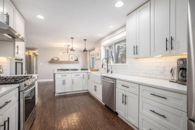 Welcome home to this beautifully remodeled 4-bedroom, 3-bath on Lakes of the Four Seasons Country Club in Indiana - for sale on GolfHomes.com, golf home, golf lot
