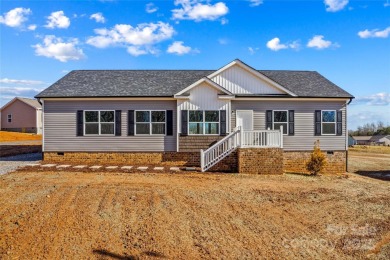 Located in the River Rock neighborhood, this brand new home on River Oaks Country Club in North Carolina - for sale on GolfHomes.com, golf home, golf lot