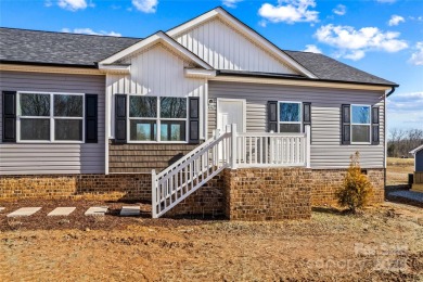 Located in the River Rock neighborhood, this brand new home on River Oaks Country Club in North Carolina - for sale on GolfHomes.com, golf home, golf lot