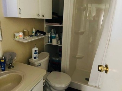 This home is in a 55 plus senior park with a monthly lot rent of on Crystal Lake Club in Florida - for sale on GolfHomes.com, golf home, golf lot