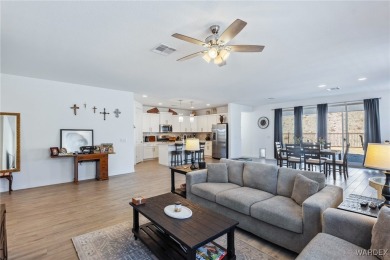 Looking for that PRACTICALLY NEW home with RV GARAGE? Take a on Laughlin Ranch Golf Club in Arizona - for sale on GolfHomes.com, golf home, golf lot