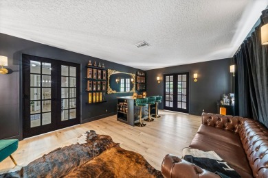Your Private Oasis Awaits in Whippoorwill Lakes! Tucked away in on Banyan Golf Club in Florida - for sale on GolfHomes.com, golf home, golf lot