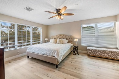 Your Private Oasis Awaits in Whippoorwill Lakes! Tucked away in on Banyan Golf Club in Florida - for sale on GolfHomes.com, golf home, golf lot