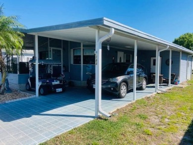 This home is in a 55 plus senior park with a monthly lot rent of on Crystal Lake Club in Florida - for sale on GolfHomes.com, golf home, golf lot