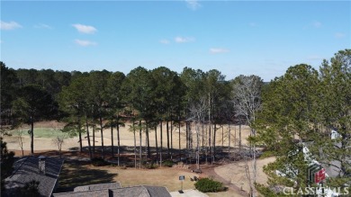 Your opportunity to own a nicely wooded, private homesite in on Harbor Club Golf and Country Club in Georgia - for sale on GolfHomes.com, golf home, golf lot