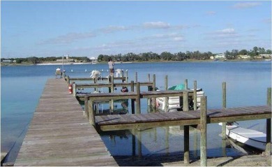 This home is in a 55 plus senior park with a monthly lot rent of on Crystal Lake Club in Florida - for sale on GolfHomes.com, golf home, golf lot