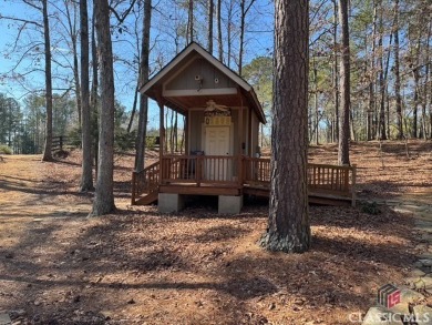 Your opportunity to own a nicely wooded, private homesite in on Harbor Club Golf and Country Club in Georgia - for sale on GolfHomes.com, golf home, golf lot