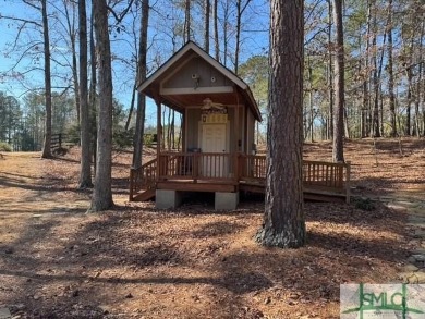 Your opportunity to own a nicely wooded, private homesite in on Harbor Club Golf and Country Club in Georgia - for sale on GolfHomes.com, golf home, golf lot