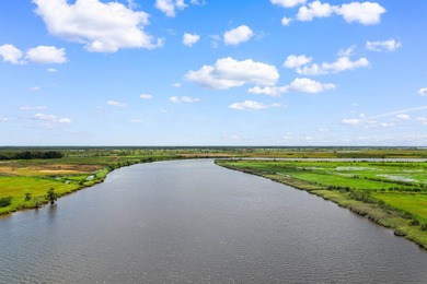 Imagine enjoying your morning coffee on the back patio here at on Wedgefield Plantation Golf Club in South Carolina - for sale on GolfHomes.com, golf home, golf lot