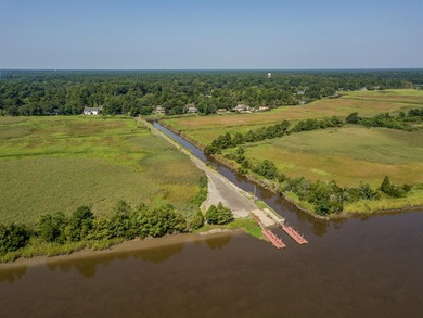 Imagine enjoying your morning coffee on the back patio here at on Wedgefield Plantation Golf Club in South Carolina - for sale on GolfHomes.com, golf home, golf lot