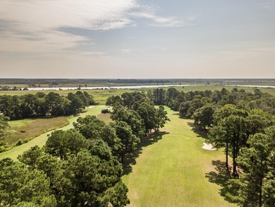 Imagine enjoying your morning coffee on the back patio here at on Wedgefield Plantation Golf Club in South Carolina - for sale on GolfHomes.com, golf home, golf lot