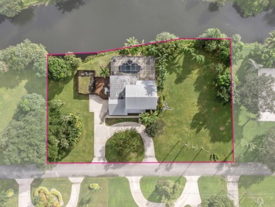 Your Private Oasis Awaits in Whippoorwill Lakes! Tucked away in on Banyan Golf Club in Florida - for sale on GolfHomes.com, golf home, golf lot