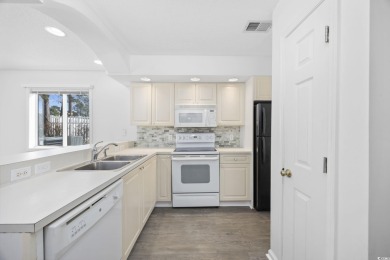 Discover this charming first-floor, end-unit condo located in on  in South Carolina - for sale on GolfHomes.com, golf home, golf lot