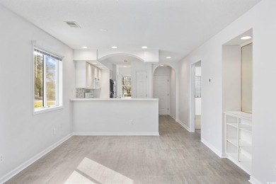 Discover this charming first-floor, end-unit condo located in on  in South Carolina - for sale on GolfHomes.com, golf home, golf lot