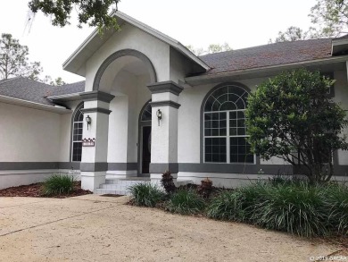 This 4-bedroom, 3.5 bathroom pool home backing to the green of on Turkey Creek Golf and Country Club in Florida - for sale on GolfHomes.com, golf home, golf lot