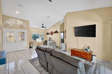 BRAND NEW ROOF! SPARKLING POOL! TWO PRIMARY BEDROOM SUITES! on The Grand Club - Pine Lakes Course in Florida - for sale on GolfHomes.com, golf home, golf lot