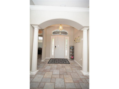 Welcome to this beautiful Pool home overlooking the Turtle Run on Sun n Lake Golf and Country Club in Florida - for sale on GolfHomes.com, golf home, golf lot