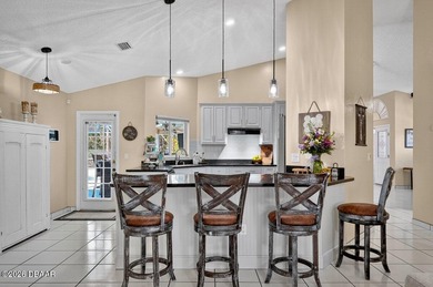 BRAND NEW ROOF! SPARKLING POOL! TWO PRIMARY BEDROOM SUITES! on The Grand Club - Pine Lakes Course in Florida - for sale on GolfHomes.com, golf home, golf lot