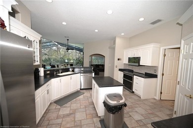 Welcome to this beautiful Pool home overlooking the Turtle Run on Sun n Lake Golf and Country Club in Florida - for sale on GolfHomes.com, golf home, golf lot