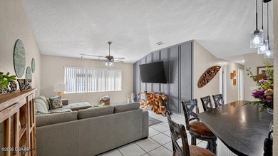 BRAND NEW ROOF! SPARKLING POOL! TWO PRIMARY BEDROOM SUITES! on The Grand Club - Pine Lakes Course in Florida - for sale on GolfHomes.com, golf home, golf lot