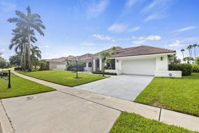 Magnificent 5BR/3BA pool home in Stonebridge CC in Boca Raton on Stonebridge Golf and Country Club in Florida - for sale on GolfHomes.com, golf home, golf lot