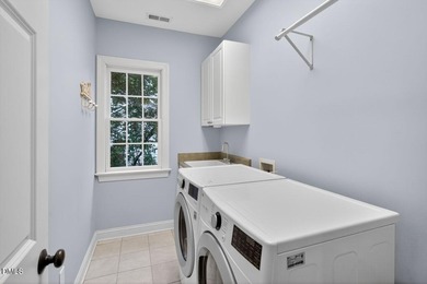 Nestled in the award-winning Heritage community, located in Wake on Heritage Golf Club in North Carolina - for sale on GolfHomes.com, golf home, golf lot