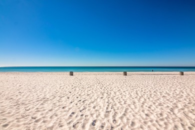 Discover one of PCB's most desirable gated beach resorts! This on Edgewater Beach Resort in Florida - for sale on GolfHomes.com, golf home, golf lot