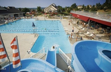 A former model home built by Homes by Dickerson, the level of on Heritage Golf Club in North Carolina - for sale on GolfHomes.com, golf home, golf lot