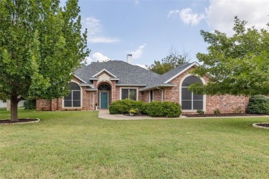 One owner custom built home with tons of recent updates located on Pecan Plantation Country Club in Texas - for sale on GolfHomes.com, golf home, golf lot