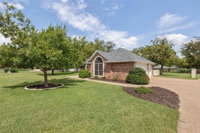 One owner custom built home with tons of recent updates located on Pecan Plantation Country Club in Texas - for sale on GolfHomes.com, golf home, golf lot