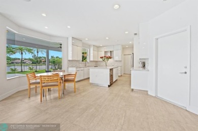 WELCOME TO THIS STUNNING COMPLETELY REMODELED 2 STORY RESIDENCE on Weston Hills Country Club in Florida - for sale on GolfHomes.com, golf home, golf lot