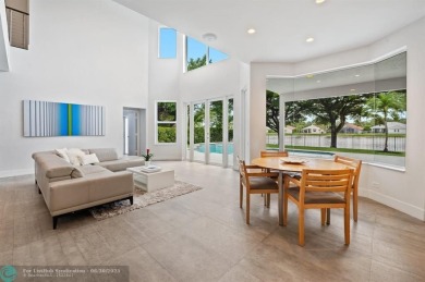 WELCOME TO THIS STUNNING COMPLETELY REMODELED 2 STORY RESIDENCE on Weston Hills Country Club in Florida - for sale on GolfHomes.com, golf home, golf lot