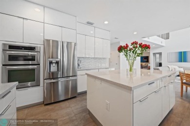WELCOME TO THIS STUNNING COMPLETELY REMODELED 2 STORY RESIDENCE on Weston Hills Country Club in Florida - for sale on GolfHomes.com, golf home, golf lot