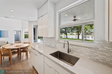 WELCOME TO THIS STUNNING COMPLETELY REMODELED 2 STORY RESIDENCE on Weston Hills Country Club in Florida - for sale on GolfHomes.com, golf home, golf lot