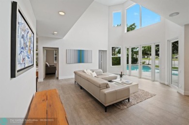 WELCOME TO THIS STUNNING COMPLETELY REMODELED 2 STORY RESIDENCE on Weston Hills Country Club in Florida - for sale on GolfHomes.com, golf home, golf lot