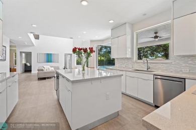 WELCOME TO THIS STUNNING COMPLETELY REMODELED 2 STORY RESIDENCE on Weston Hills Country Club in Florida - for sale on GolfHomes.com, golf home, golf lot