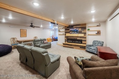 This well-maintained home in beautiful Star Valley Ranch, is all on Star Valley RV Golf Course in Wyoming - for sale on GolfHomes.com, golf home, golf lot