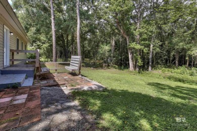 This updated 4-bedroom, 2-bath home is an excellent opportunity on Azalea City Golf Course in Alabama - for sale on GolfHomes.com, golf home, golf lot