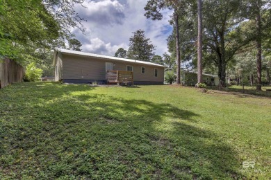 This updated 4-bedroom, 2-bath home is an excellent opportunity on Azalea City Golf Course in Alabama - for sale on GolfHomes.com, golf home, golf lot