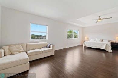 WELCOME TO THIS STUNNING COMPLETELY REMODELED 2 STORY RESIDENCE on Weston Hills Country Club in Florida - for sale on GolfHomes.com, golf home, golf lot