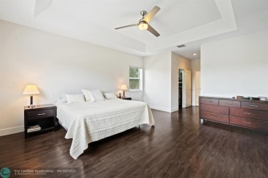 WELCOME TO THIS STUNNING COMPLETELY REMODELED 2 STORY RESIDENCE on Weston Hills Country Club in Florida - for sale on GolfHomes.com, golf home, golf lot