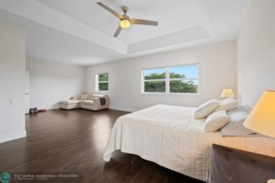 WELCOME TO THIS STUNNING COMPLETELY REMODELED 2 STORY RESIDENCE on Weston Hills Country Club in Florida - for sale on GolfHomes.com, golf home, golf lot