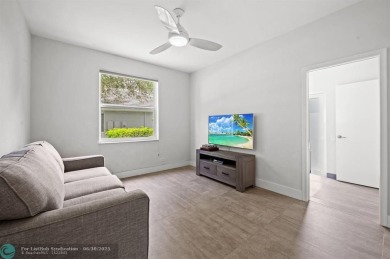 WELCOME TO THIS STUNNING COMPLETELY REMODELED 2 STORY RESIDENCE on Weston Hills Country Club in Florida - for sale on GolfHomes.com, golf home, golf lot