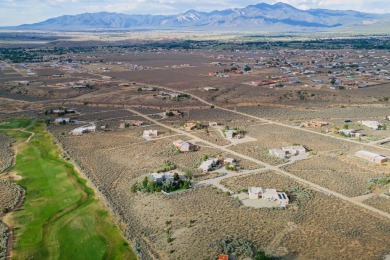 Beautiful Vista Linda building site that borders the golf course on Taos Country Club in New Mexico - for sale on GolfHomes.com, golf home, golf lot