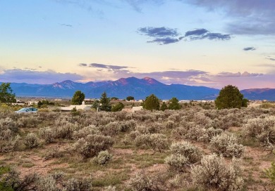 Beautiful Vista Linda building site that borders the golf course on Taos Country Club in New Mexico - for sale on GolfHomes.com, golf home, golf lot