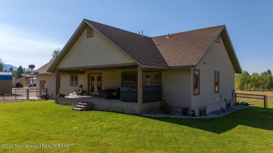 This well-maintained home in beautiful Star Valley Ranch, is all on Star Valley RV Golf Course in Wyoming - for sale on GolfHomes.com, golf home, golf lot