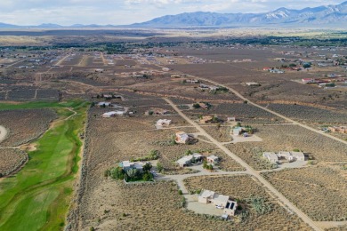 Beautiful Vista Linda building site that borders the golf course on Taos Country Club in New Mexico - for sale on GolfHomes.com, golf home, golf lot