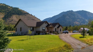 This well-maintained home in beautiful Star Valley Ranch, is all on Star Valley RV Golf Course in Wyoming - for sale on GolfHomes.com, golf home, golf lot