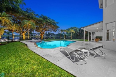 WELCOME TO THIS STUNNING COMPLETELY REMODELED 2 STORY RESIDENCE on Weston Hills Country Club in Florida - for sale on GolfHomes.com, golf home, golf lot