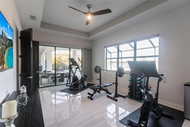 Exquisite Modern Retreat in Lakewood Ranch Country Club East - on Ritz-Carlton Members Golf Club in Florida - for sale on GolfHomes.com, golf home, golf lot